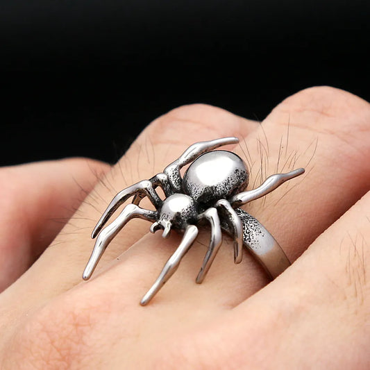 Stainless steel spider statement ring worn on finger showcasing bold gothic and punk-inspired styling.
