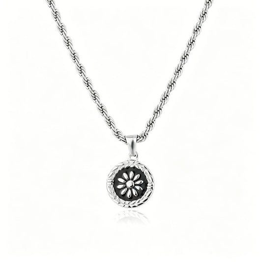 Silver-tone floral medallion pendant necklace with black enamel round charm
