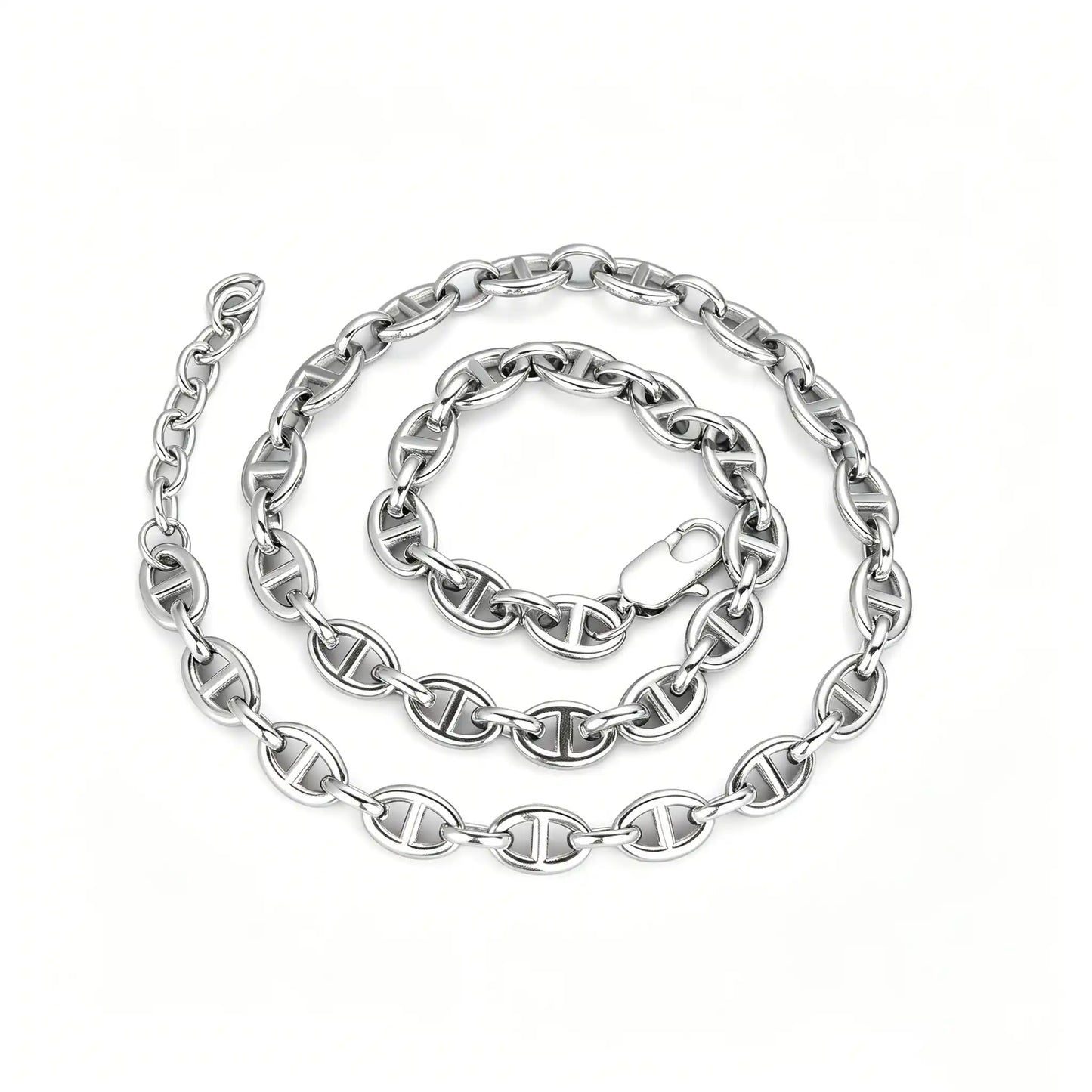 Silver stainless steel oval link chain bracelet with lobster clasp and adjustable extension chain on a white background.