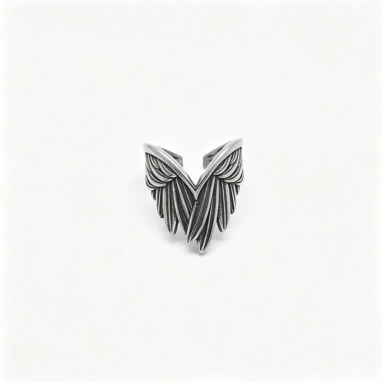 Vintage silver stainless steel adjustable ring featuring detailed angel feather wings.