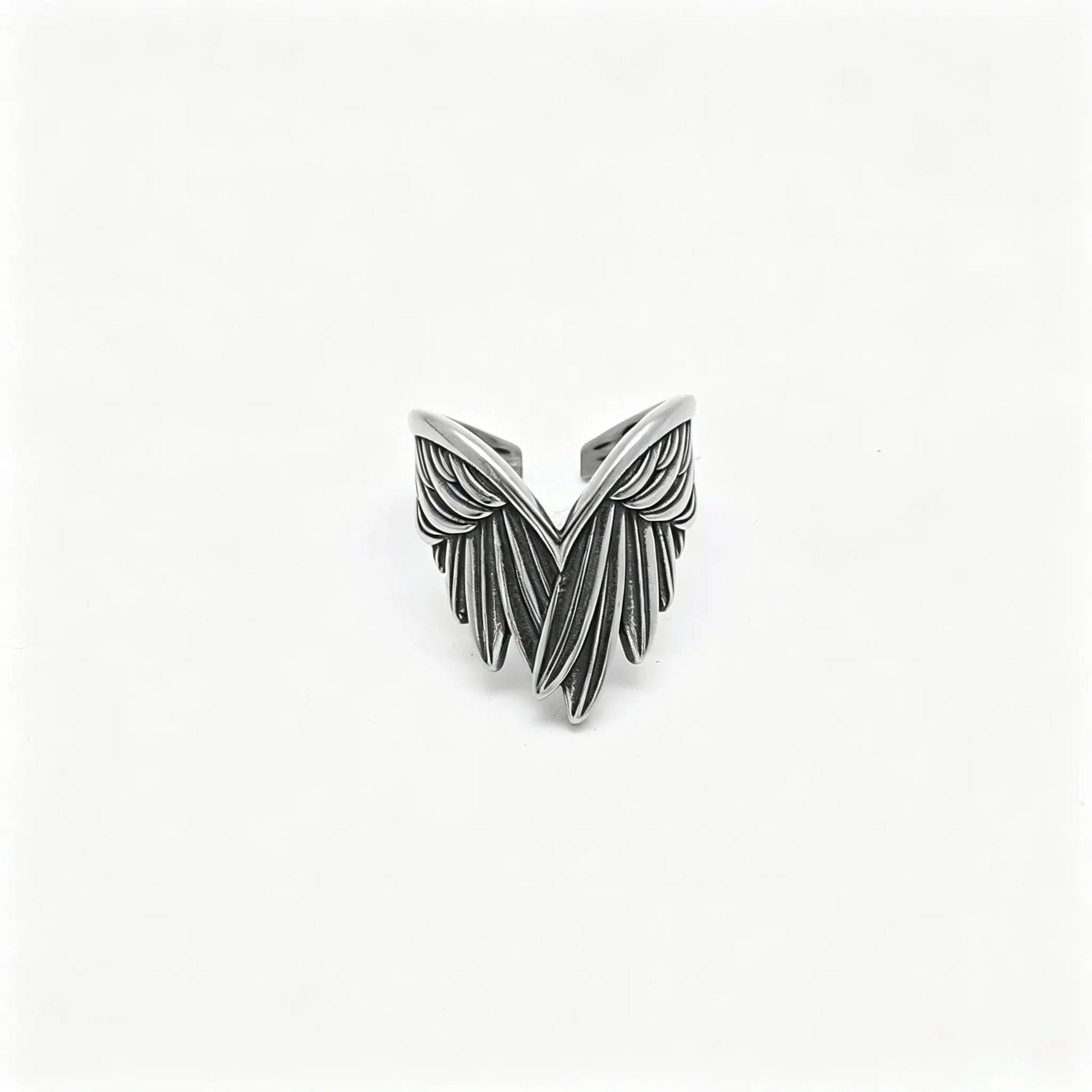 Vintage silver stainless steel adjustable ring featuring detailed angel feather wings.