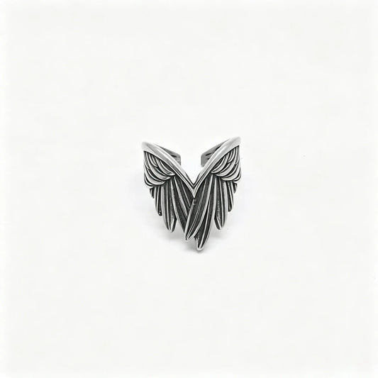 Vintage silver stainless steel adjustable ring featuring detailed angel feather wings.