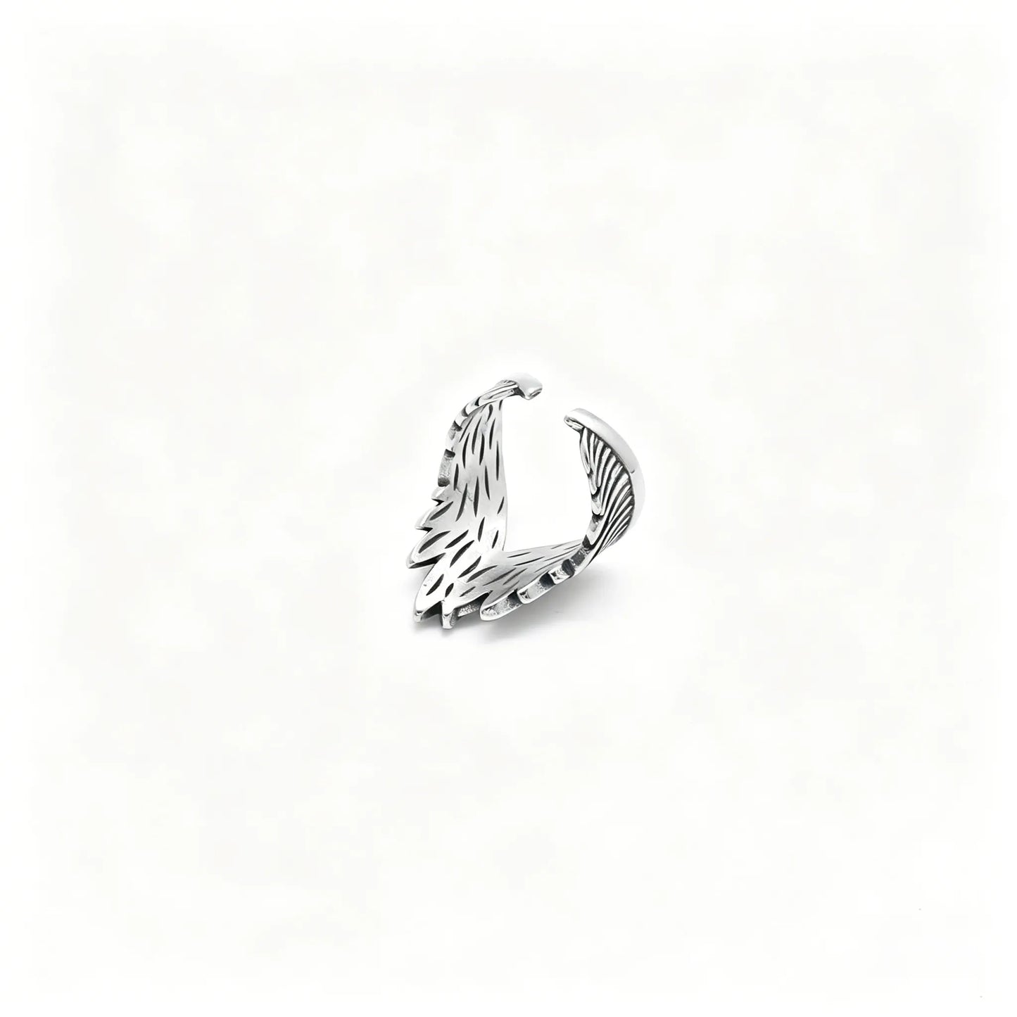 Vintage silver stainless steel adjustable ring featuring detailed angel feather wings.