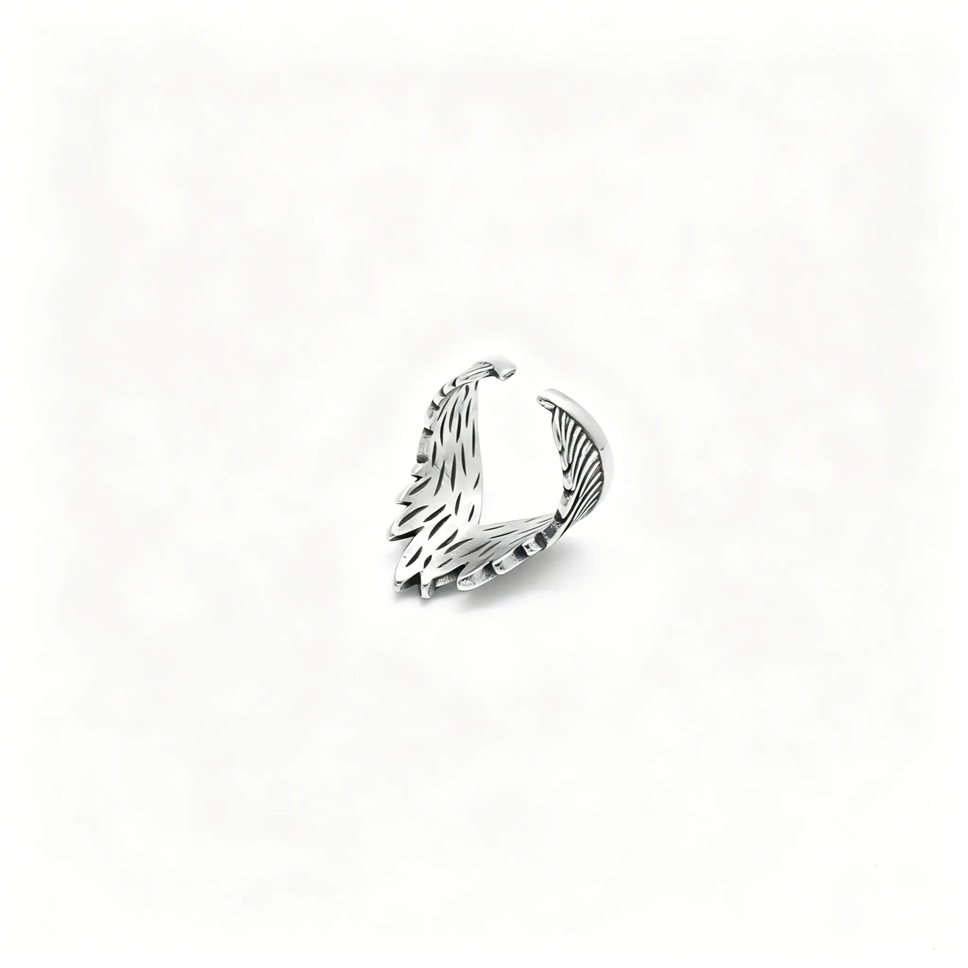 Vintage silver stainless steel adjustable ring featuring detailed angel feather wings.