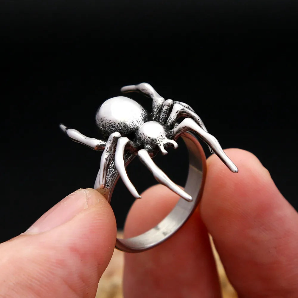 Stainless steel spider statement ring worn on finger showcasing bold gothic and punk-inspired styling.