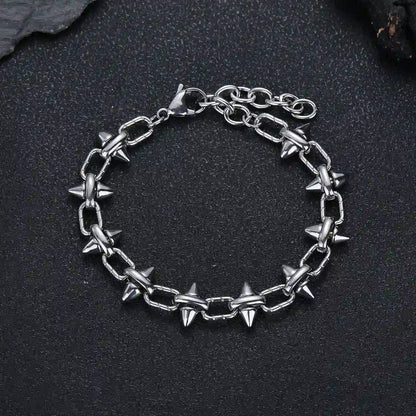 Unisex punk spiked link bracelet made of durable 316L stainless steel for an edgy streetwear look.