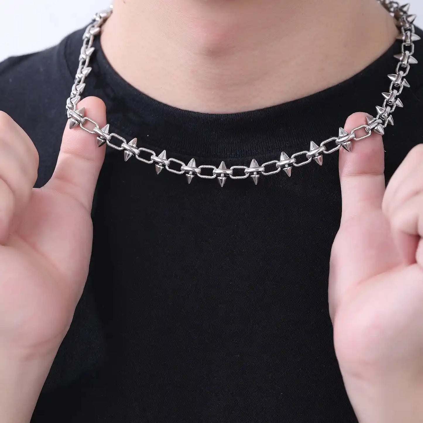 Unisex punk spiked chain necklace made of durable stainless steel for an edgy streetwear look.