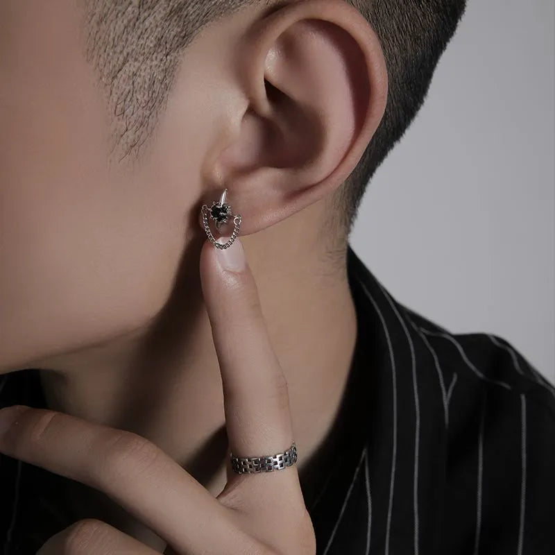Unisex gothic star chain stud earrings featuring a black center stone, crafted from 316L stainless steel.