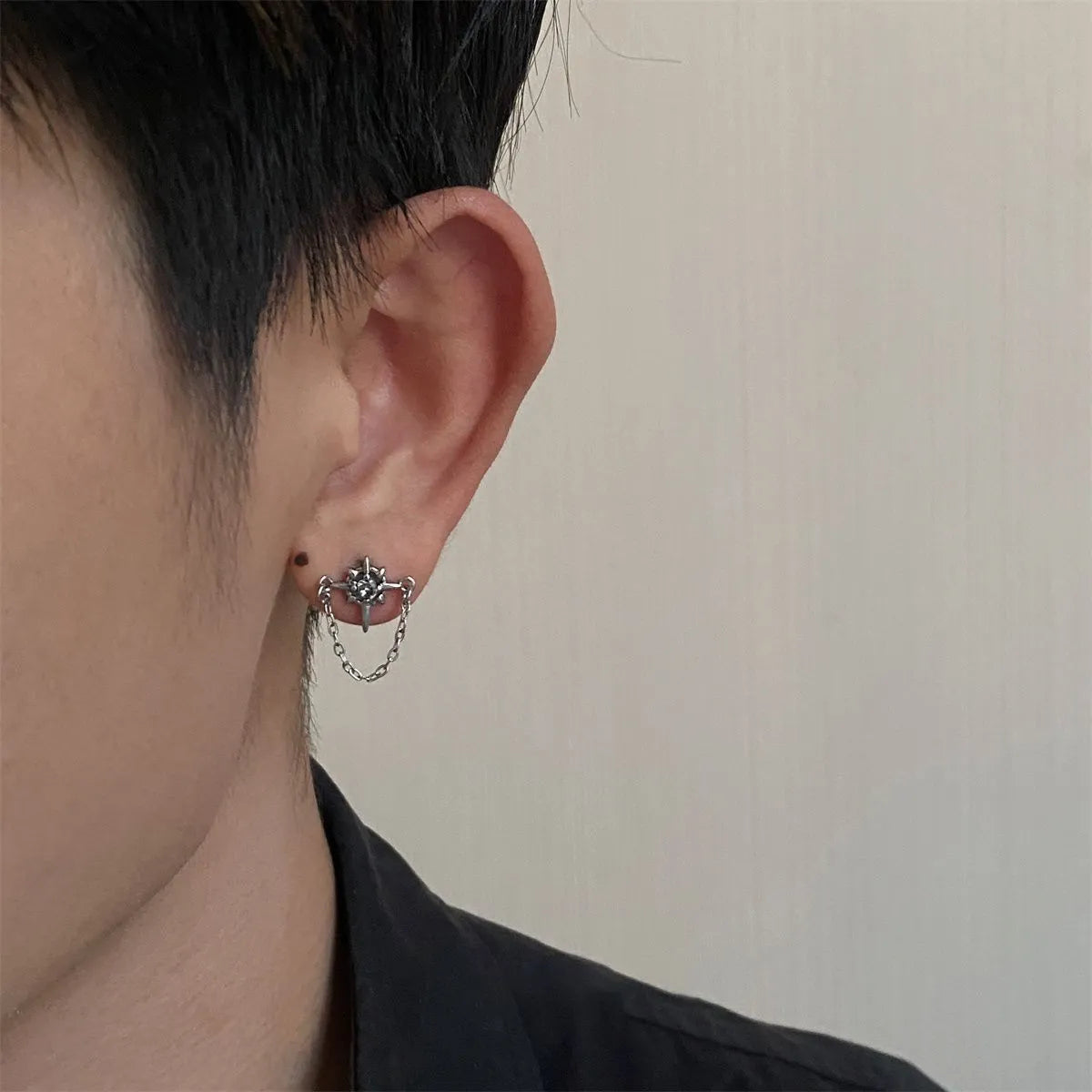 Unisex gothic star chain stud earrings featuring a clear center stone, crafted from 316L stainless steel.