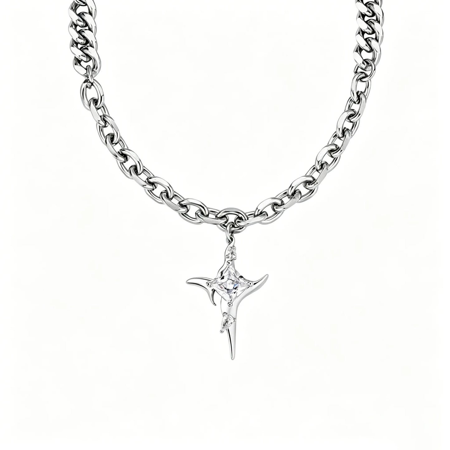 Crystal star pendant necklace with stainless steel Cuban and oval link chain in polished silver.