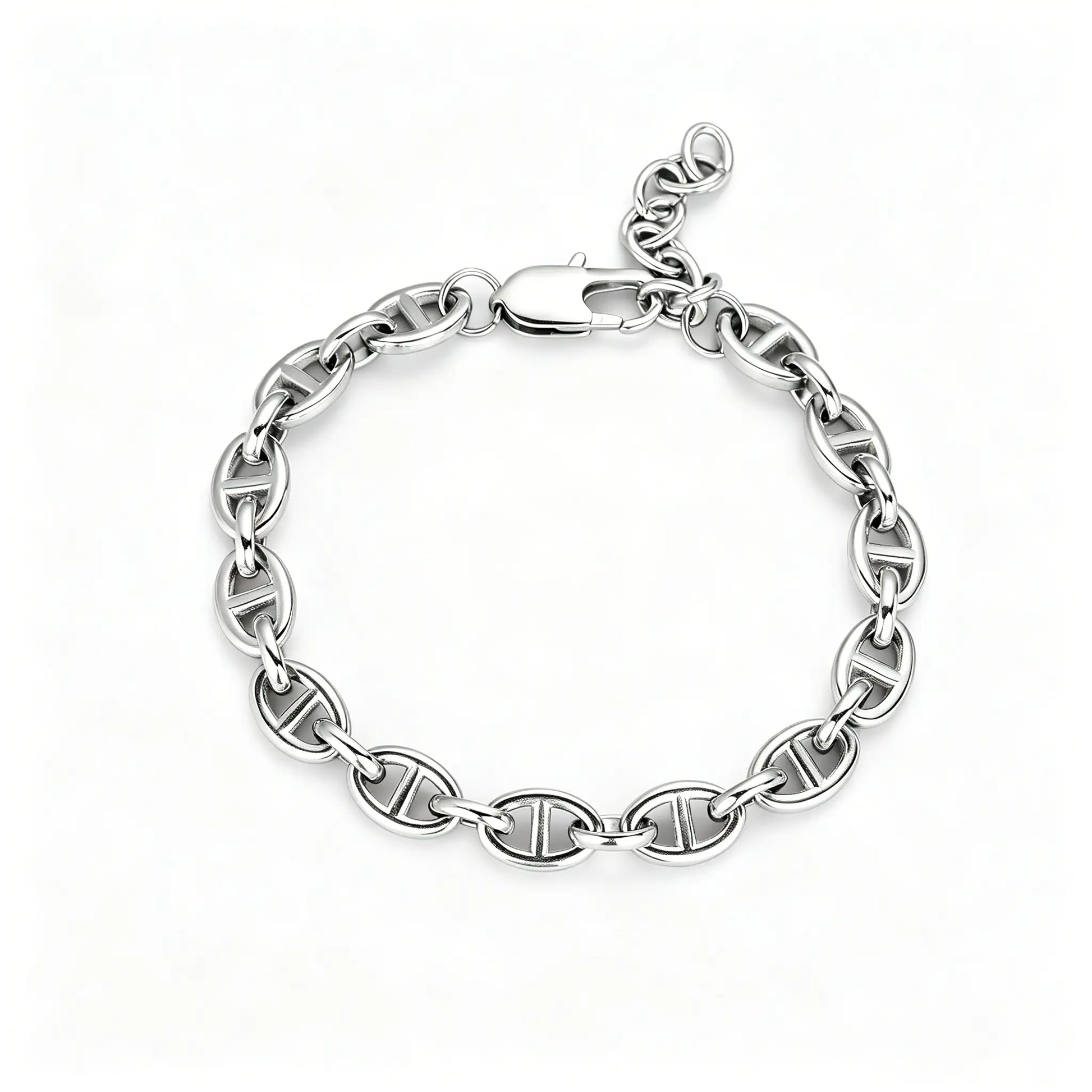 Silver stainless steel oval link chain bracelet with lobster clasp and adjustable extension chain on a white background.