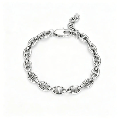 Silver stainless steel oval link chain bracelet with lobster clasp and adjustable extension chain on a white background.